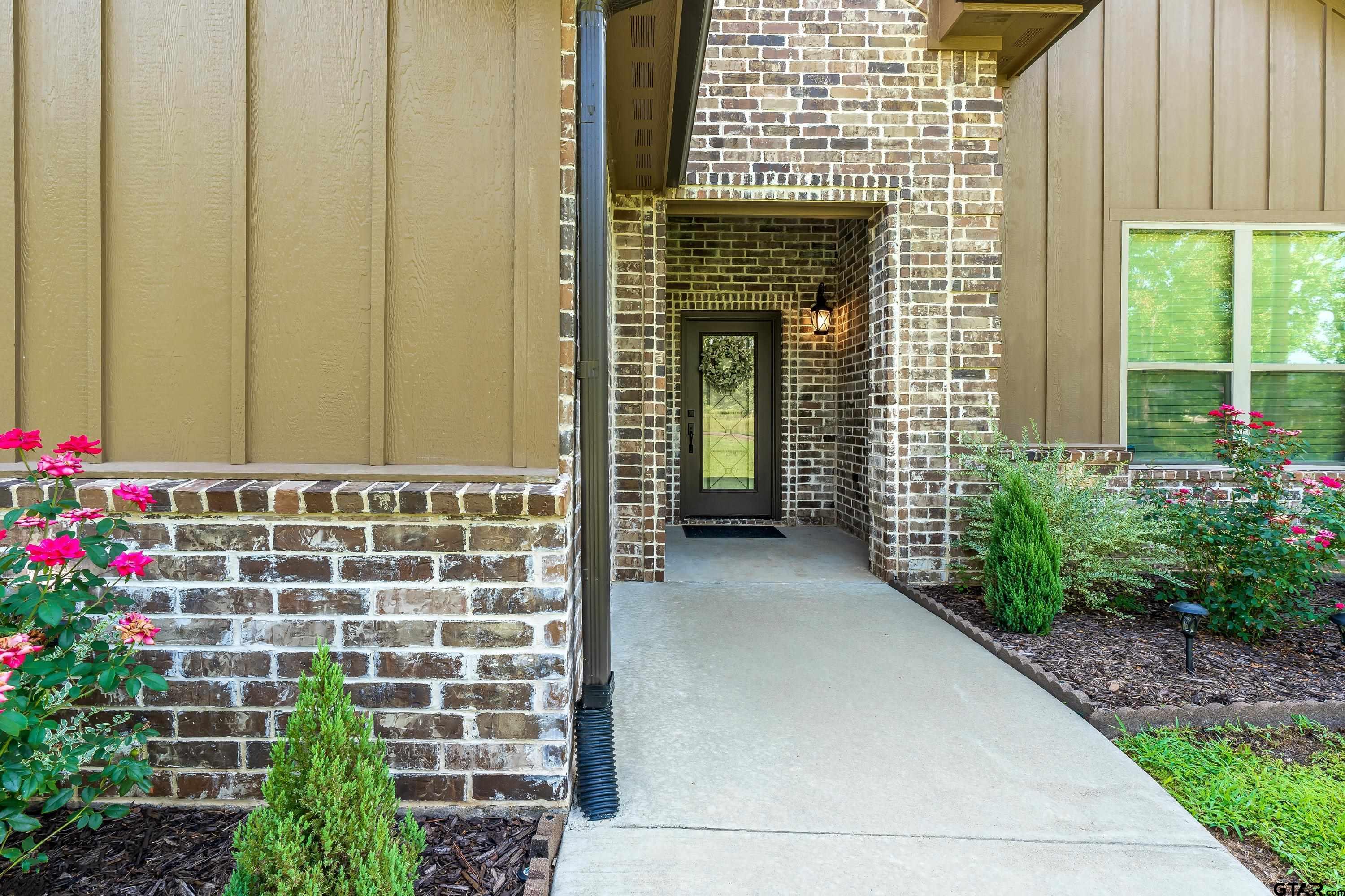 8199 Cr 314 Street South Laneville, TX 75667 - Photo 33 of 47 a view of a entryway door of the house