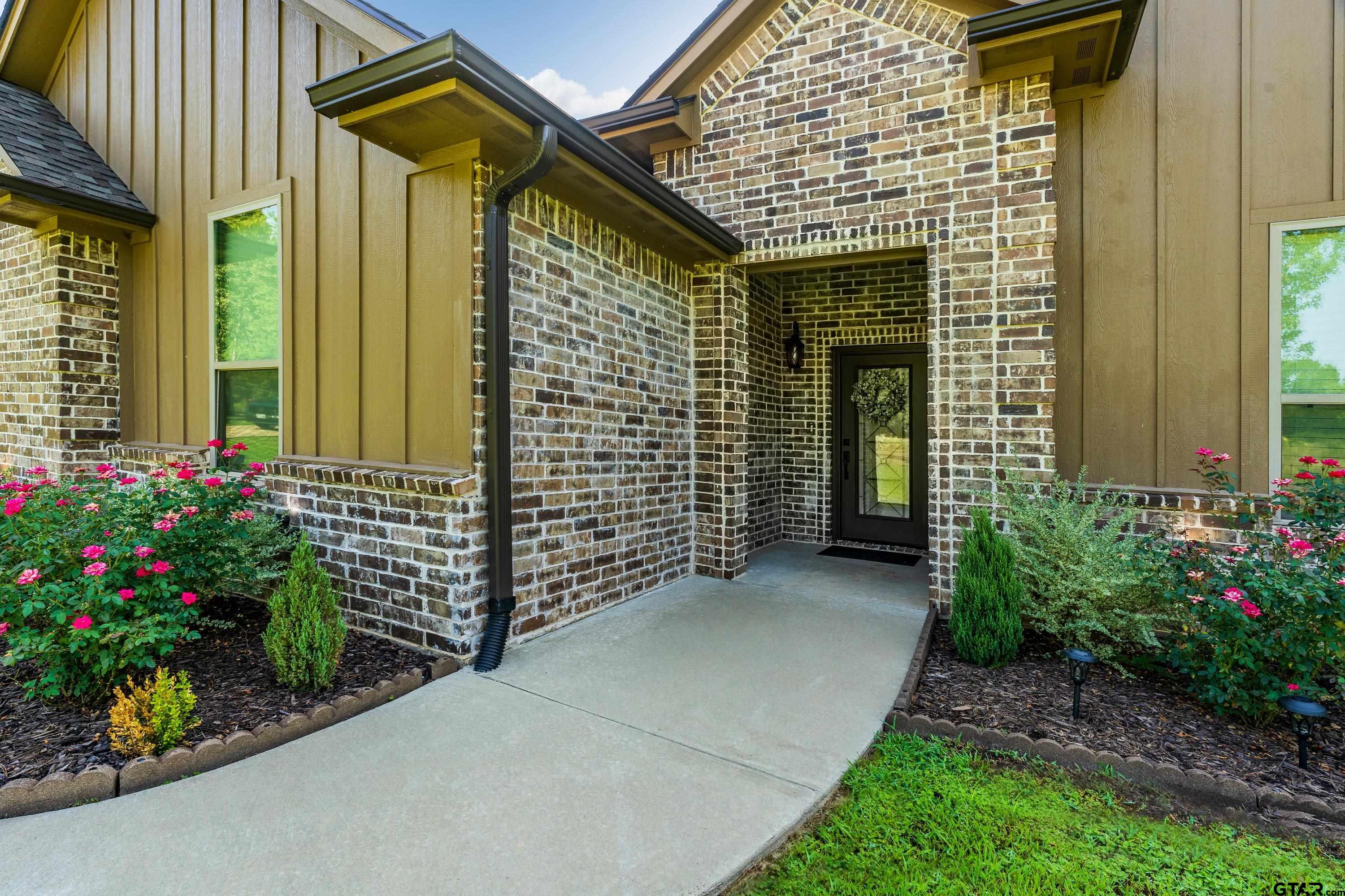 8199 Cr 314 Street South Laneville, TX 75667 - Photo 34 of 47 a view of a pathway besides a building