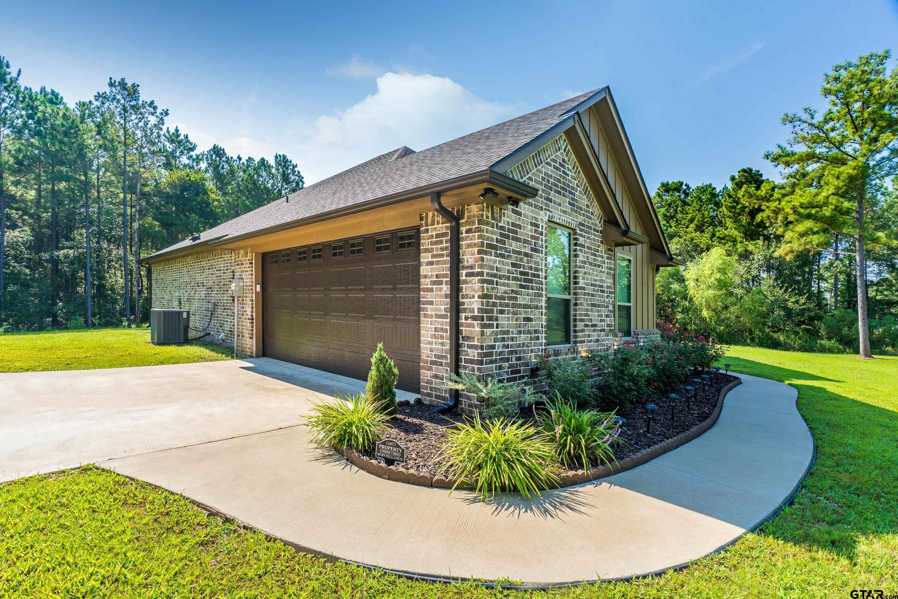 8199 Cr 314 Street South Laneville, TX 75667 - Photo 37 of 47 a view of backyard with swimming pool and outdoor seating