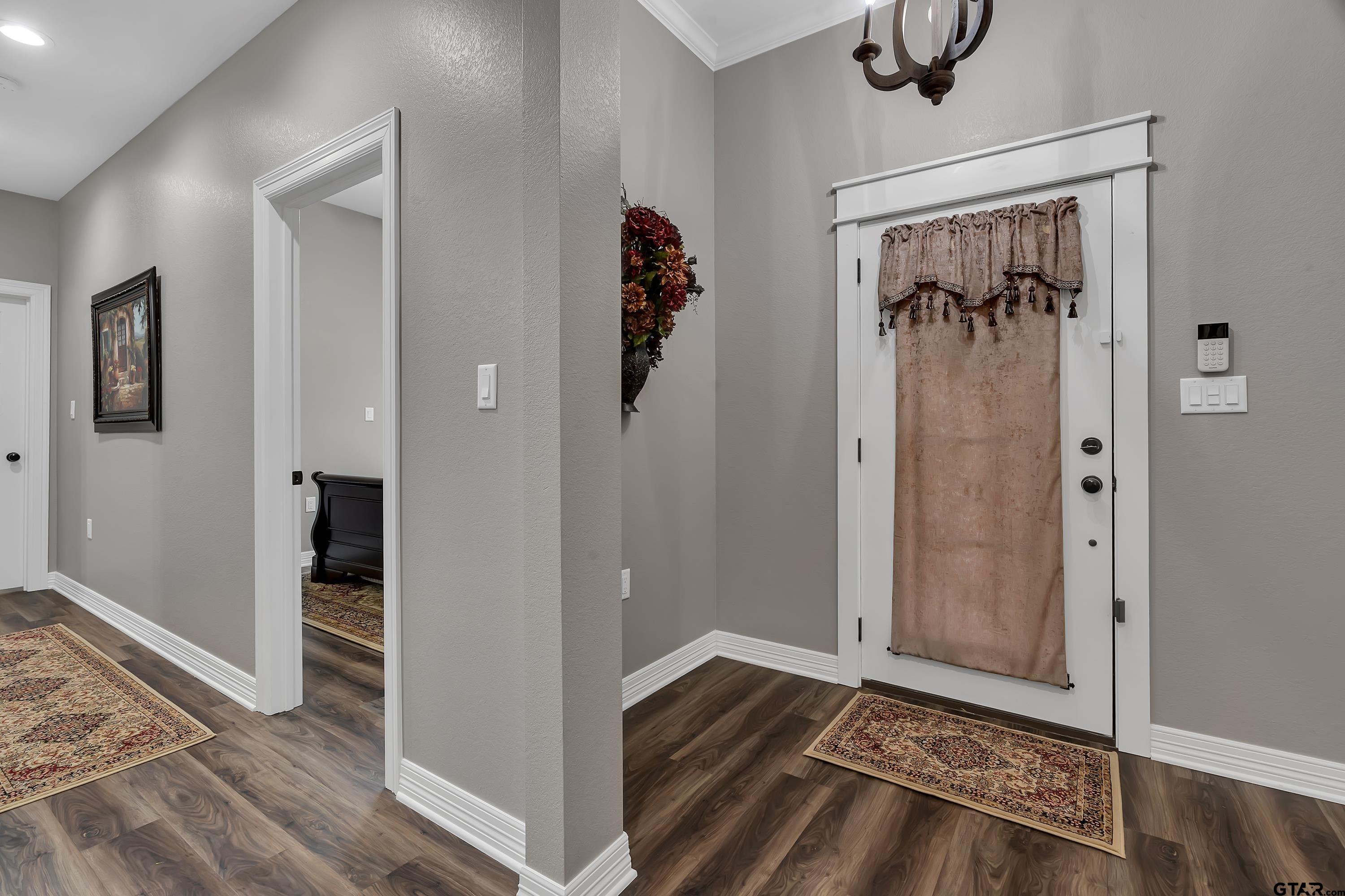 8199 Cr 314 Street South Laneville, TX 75667 - Photo 7 of 47 a view of a hallway view with wooden floor and staircase