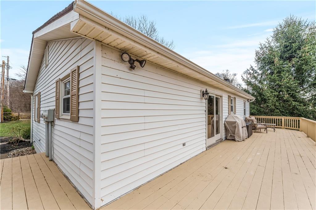 4689 Bell Road Cochranton, PA 16314 - Photo 25 of 32 a view of a house with a backyard