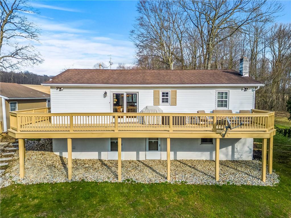 4689 Bell Road Cochranton, PA 16314 - Photo 3 of 32 a view of a house with a yard and sitting area