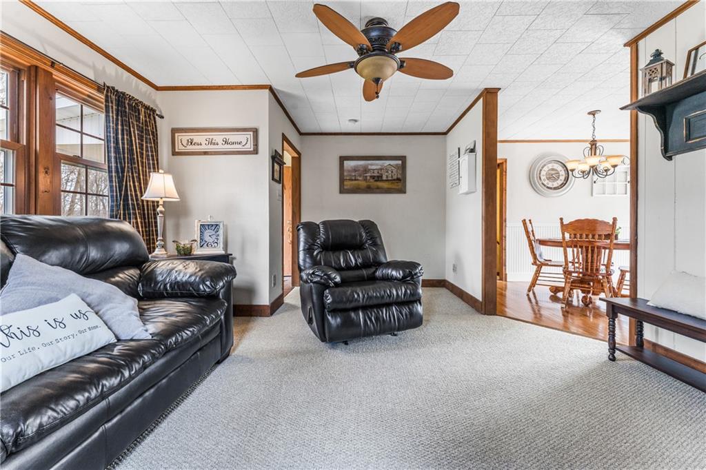 4689 Bell Road Cochranton, PA 16314 - Photo 6 of 32 a living room with furniture and a window
