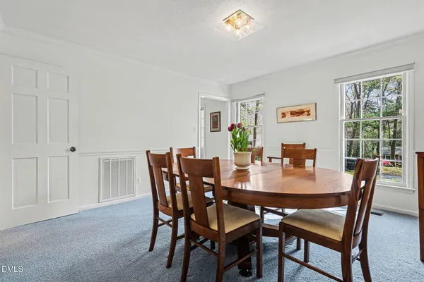 a view of a dining room with furniture
