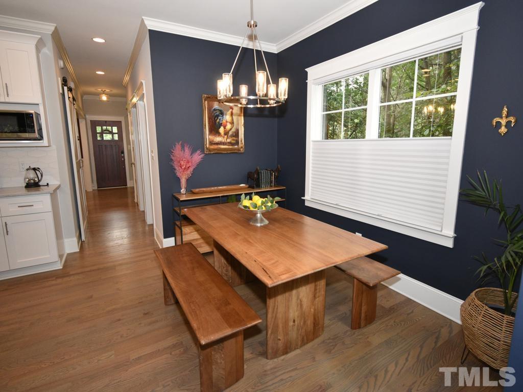 607 Morreene Road Durham, NC 27705 - Photo 12 of 48 a room with pool table and windows