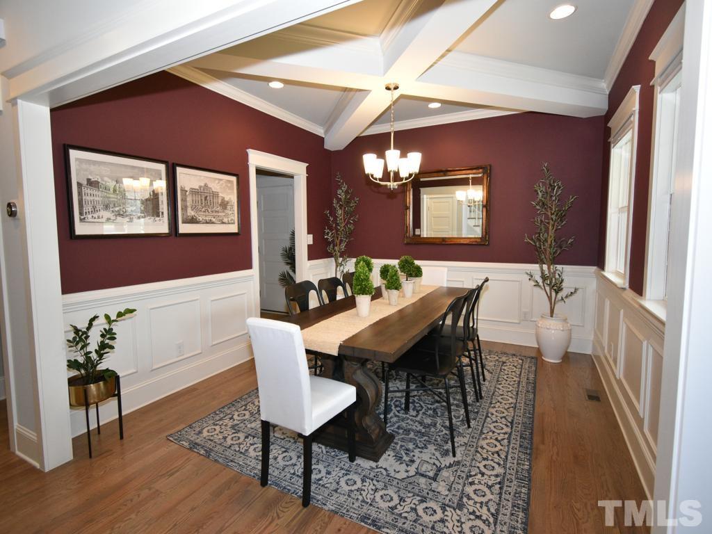 607 Morreene Road Durham, NC 27705 - Photo 13 of 48 a dining room with furniture and window