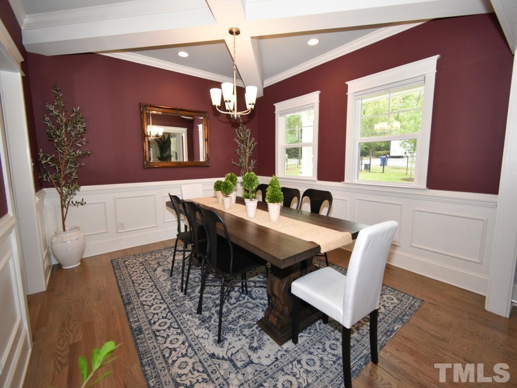 607 Morreene Road Durham, NC 27705 - Photo 14 of 48 a dining room with furniture and window