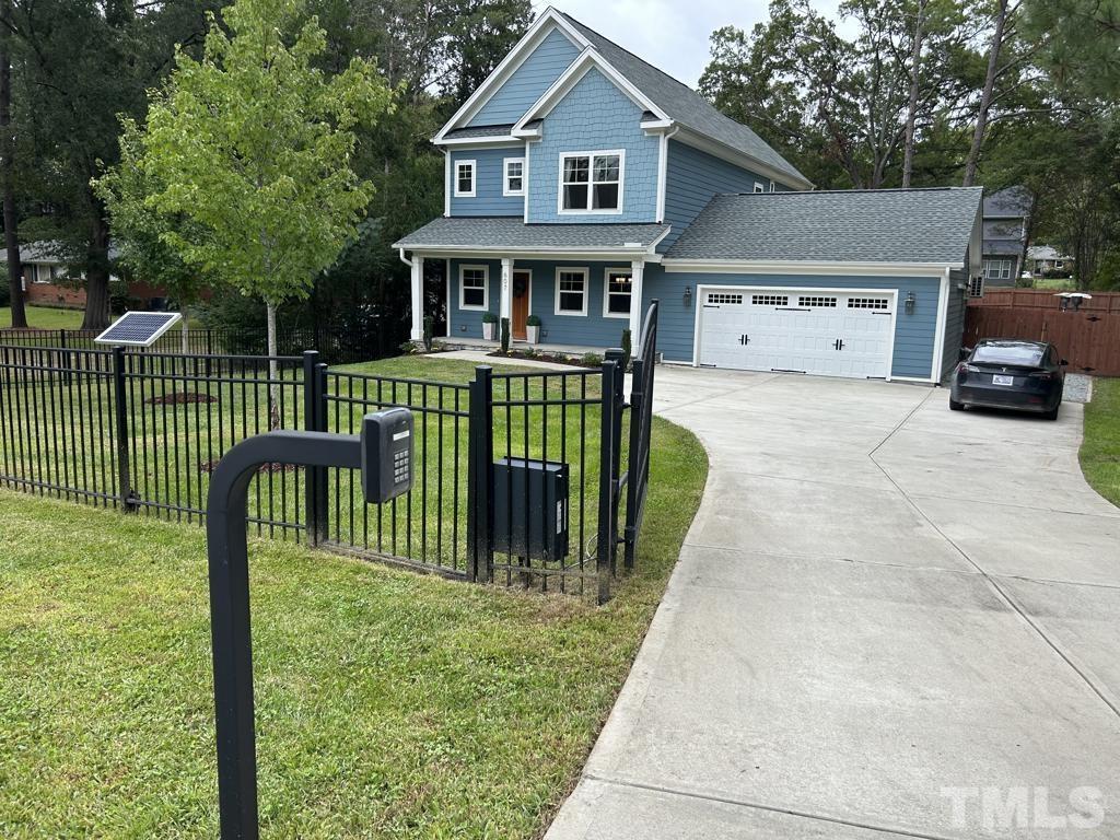 607 Morreene Road Durham, NC 27705 - Photo 40 of 48 a house view with a garden space