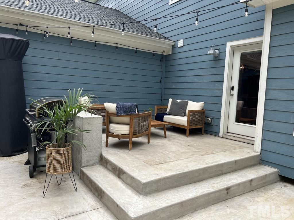 607 Morreene Road Durham, NC 27705 - Photo 41 of 48 a building outdoor space with patio furniture