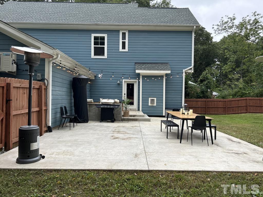 607 Morreene Road Durham, NC 27705 - Photo 43 of 48 a view of a house with patio