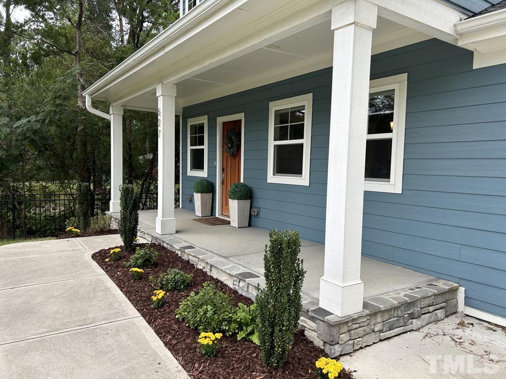 607 Morreene Road Durham, NC 27705 - Photo 48 of 48 a front view of a house with garden
