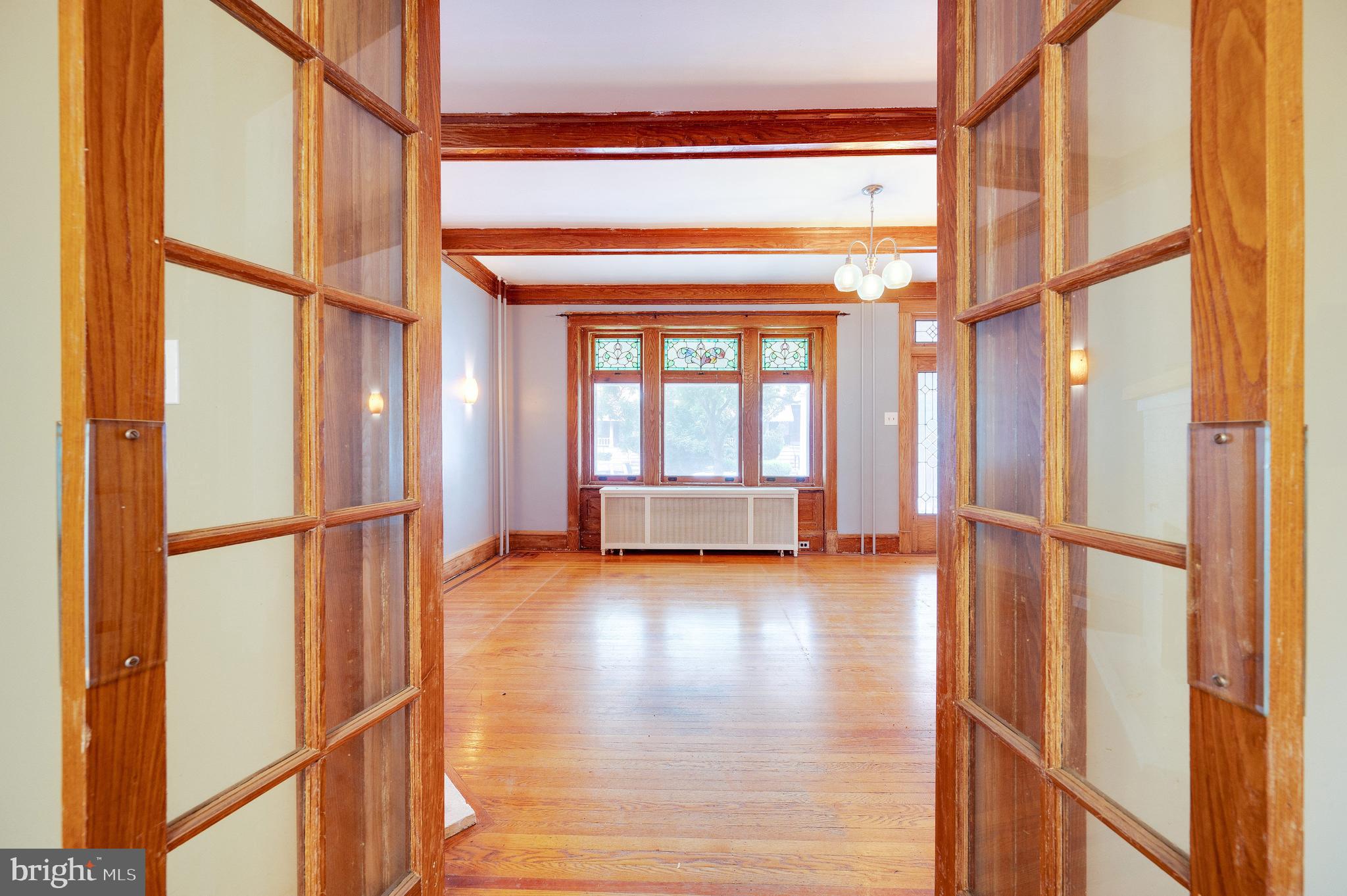 402 Spring Street Reading, PA 19601 - Photo 14 of 37 French doors into dining room