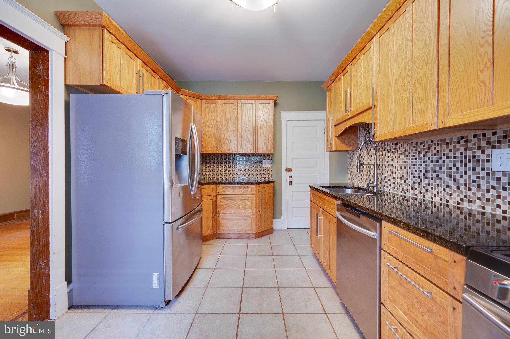 402 Spring Street Reading, PA 19601 - Photo 16 of 37 Kitchen with stainless appliances