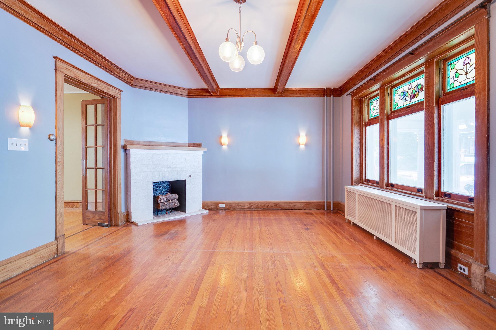 402 Spring Street Reading, PA 19601 - Photo 5 of 37 Living room with gas fireplace