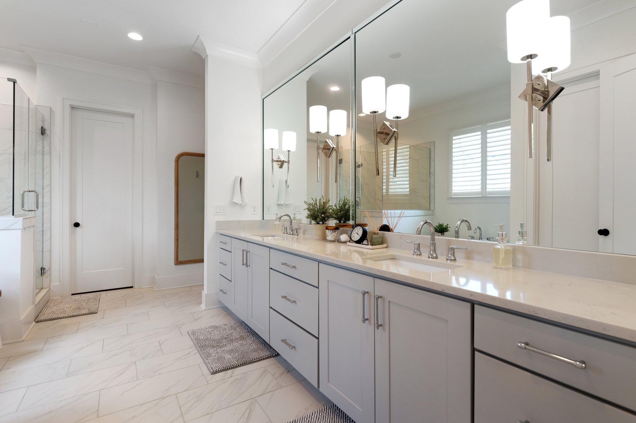 3623 Ronstadt Road Thompson's Station, TN 37179 - Photo 22 of 55 a bathroom with double sink and a mirror
