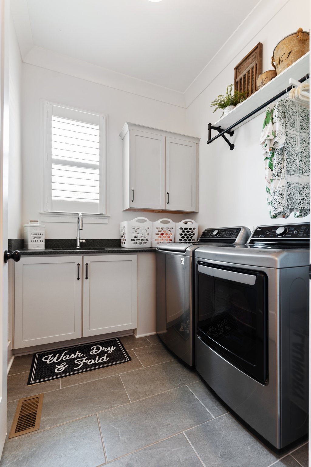 3623 Ronstadt Road Thompson's Station, TN 37179 - Photo 25 of 55 a kitchen with granite countertop a stove and a sink