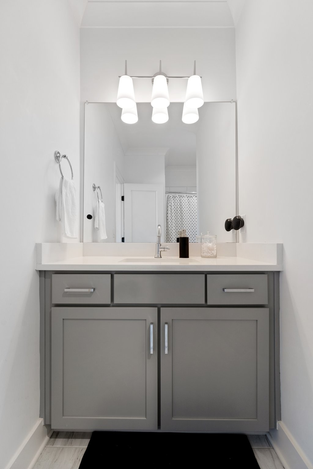 3623 Ronstadt Road Thompson's Station, TN 37179 - Photo 42 of 55 a bathroom with a sink a mirror and a light fixture