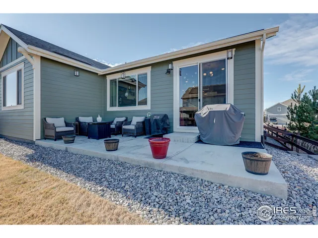 a view of a bedroom with furniture and staircase