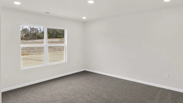 an empty room with a window