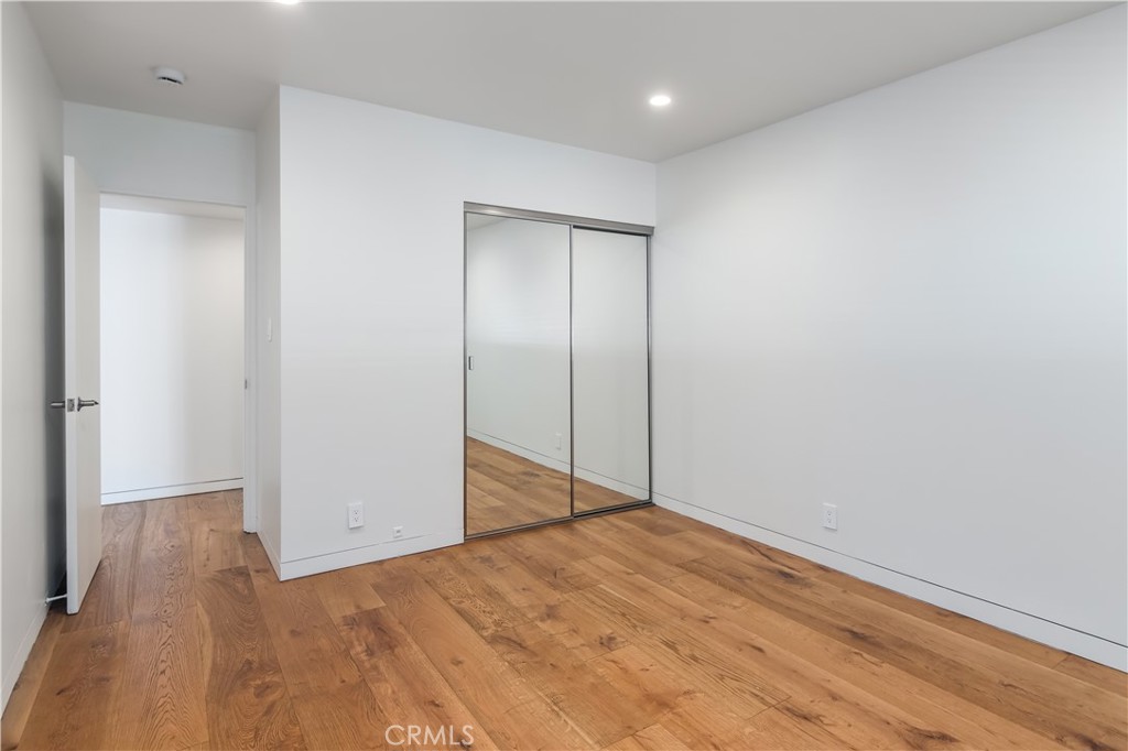 15439 Vose Street Van Nuys, CA 91406 - Photo 13 of 22 wooden floor in an empty room