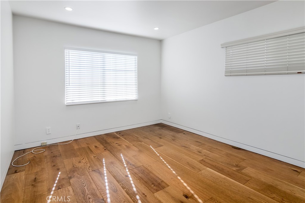15439 Vose Street Van Nuys, CA 91406 - Photo 15 of 22 an empty room with a window