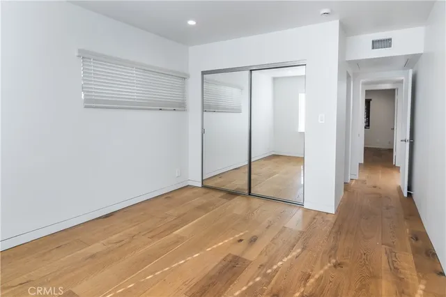a bathroom with a shower sink and mirror