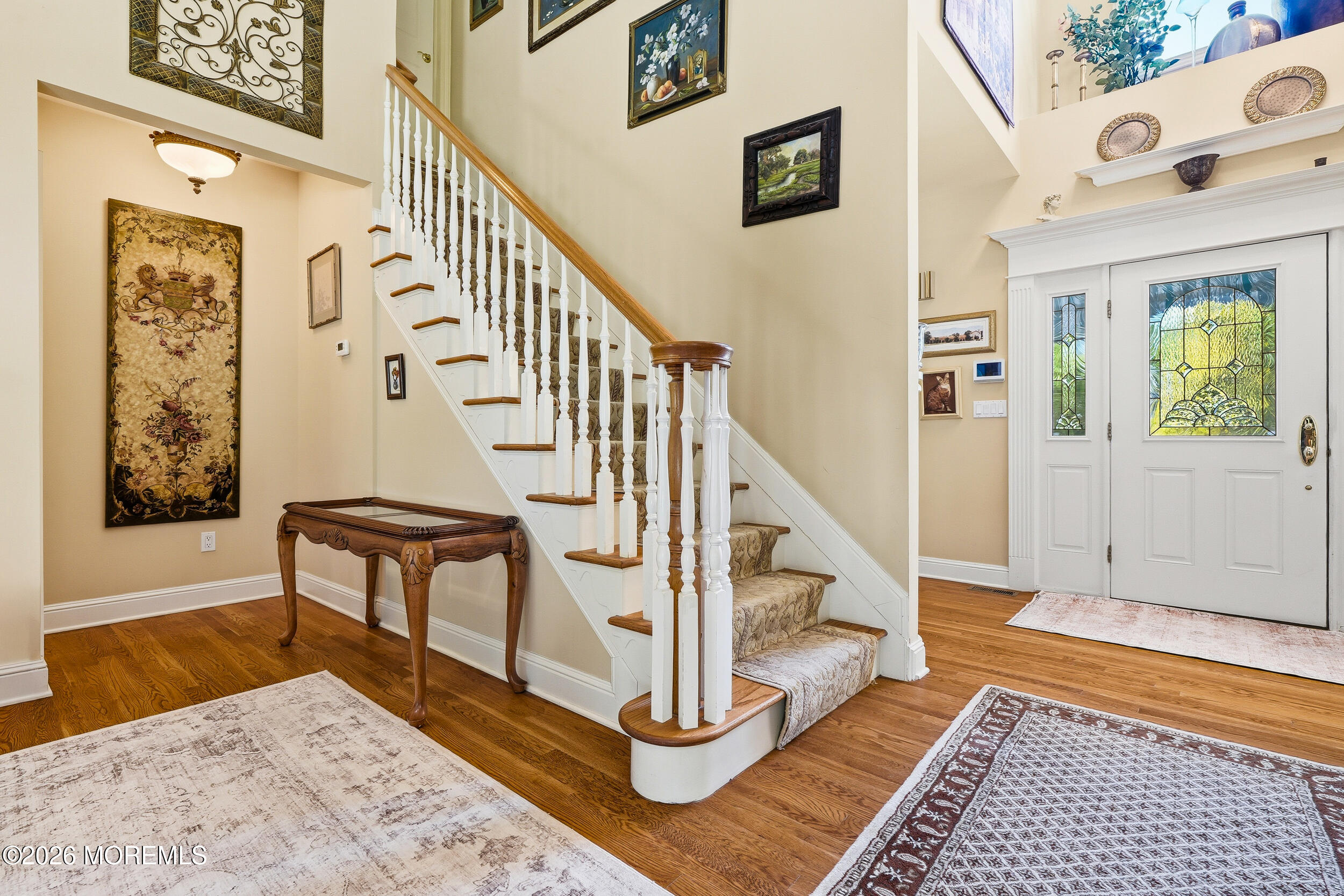 478 Rickey Lane Long Branch, NJ 07740 - Photo 20 of 64 a view of entryway bedroom and hall with wooden floor