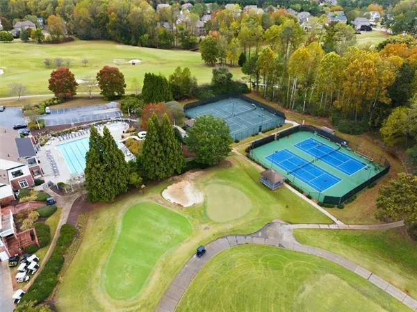 a view of swimming pool from a balcony