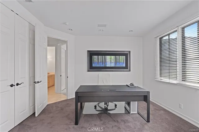 a room that has a table and a chair