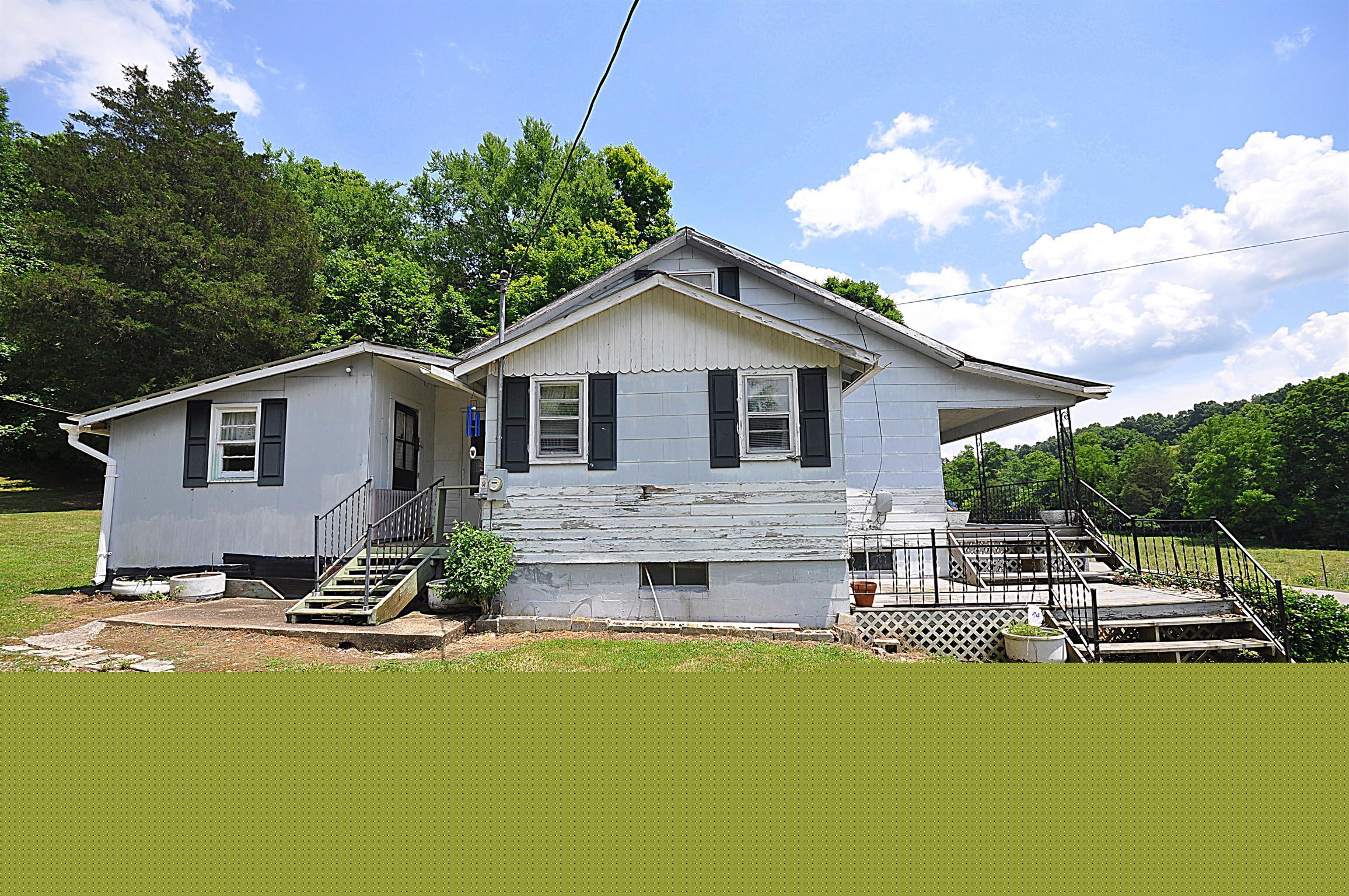 1536 Mack Bean Road Red Boiling Springs, TN 37150 - Photo 17 of 30 a front view of a house with a yard