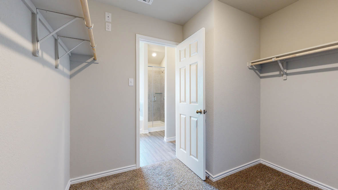 104 Kenzie Street Thorndale, TX 76577 - Photo 14 of 28 a view of a room with a hallway