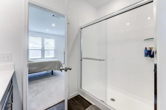 a living room with furniture window and wooden floor