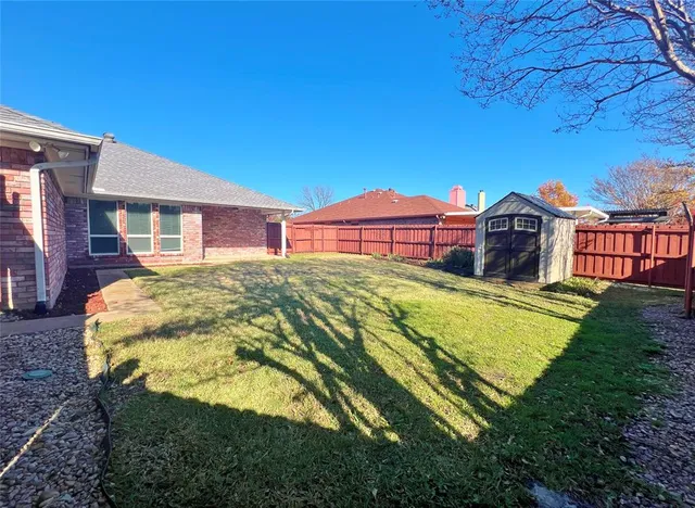 a view of a house with a big yard