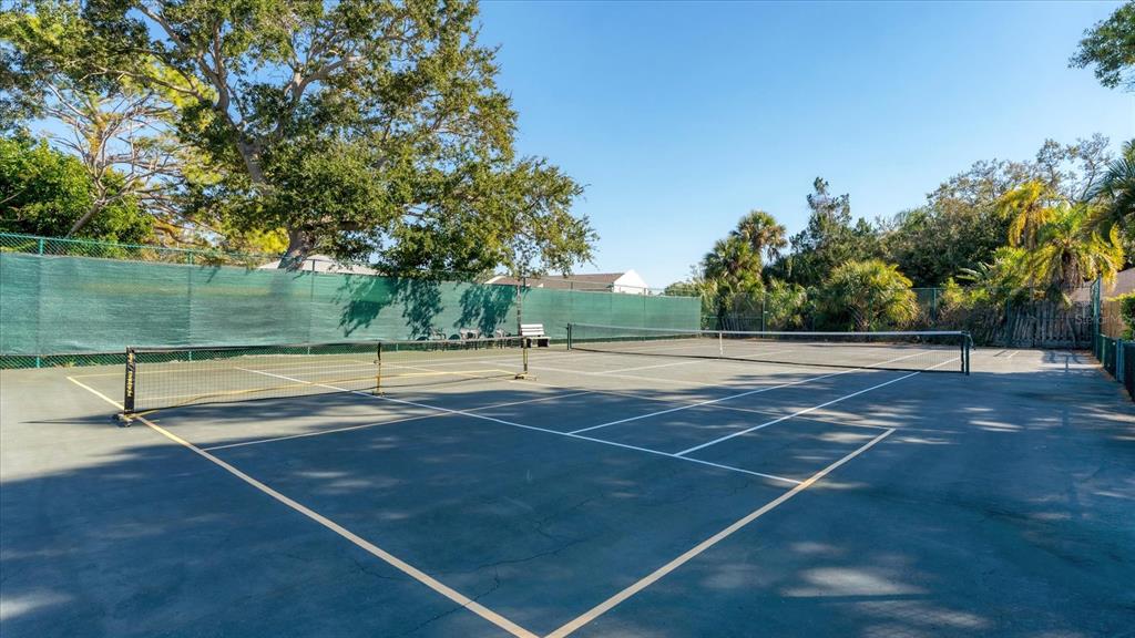 4957 Cross Creek Road, Unit 4957 Sarasota, FL 34231 - Photo 23 of 32 a view of a tennis court