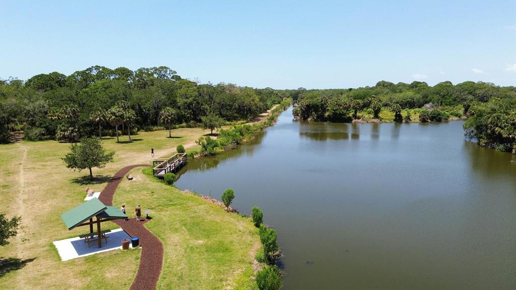 4957 Cross Creek Road, Unit 4957 Sarasota, FL 34231 - Photo 31 of 32 a view of a lake