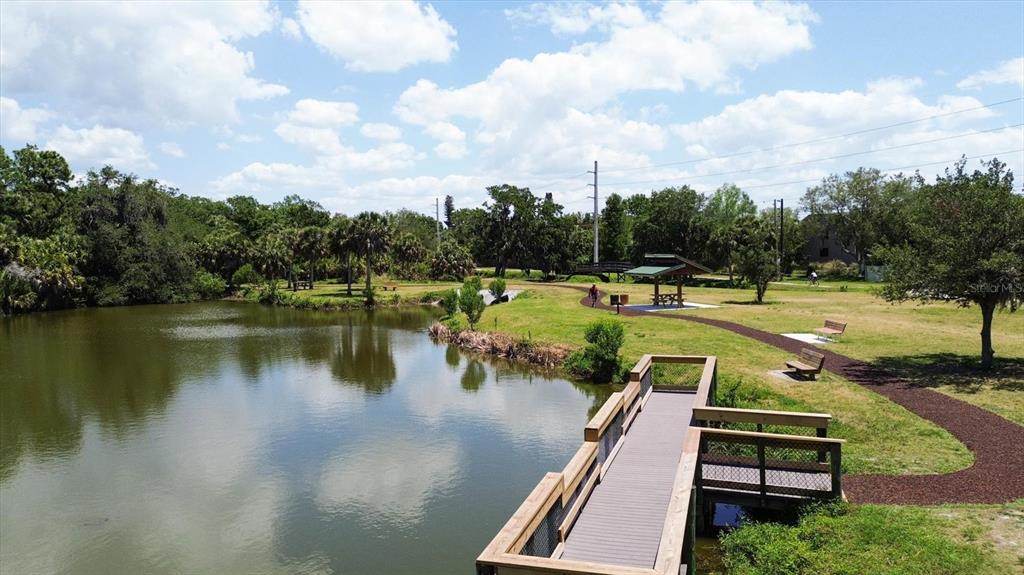 4957 Cross Creek Road, Unit 4957 Sarasota, FL 34231 - Photo 32 of 32 an aerial view of a houses with outdoor space and lake view