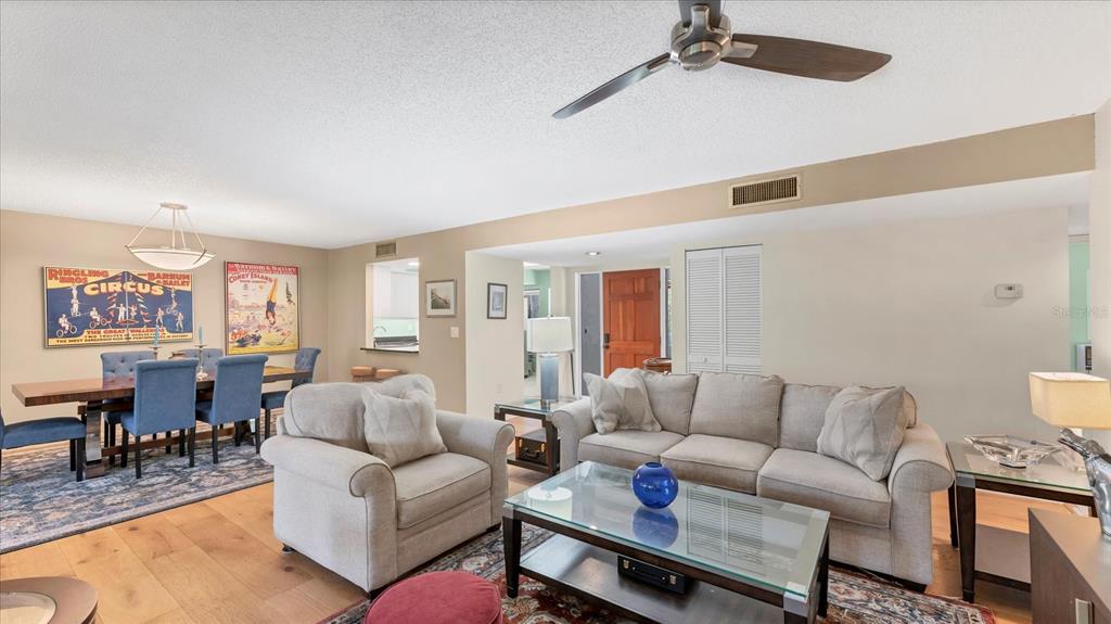 4957 Cross Creek Road, Unit 4957 Sarasota, FL 34231 - Photo 8 of 32 a living room with furniture and a large window