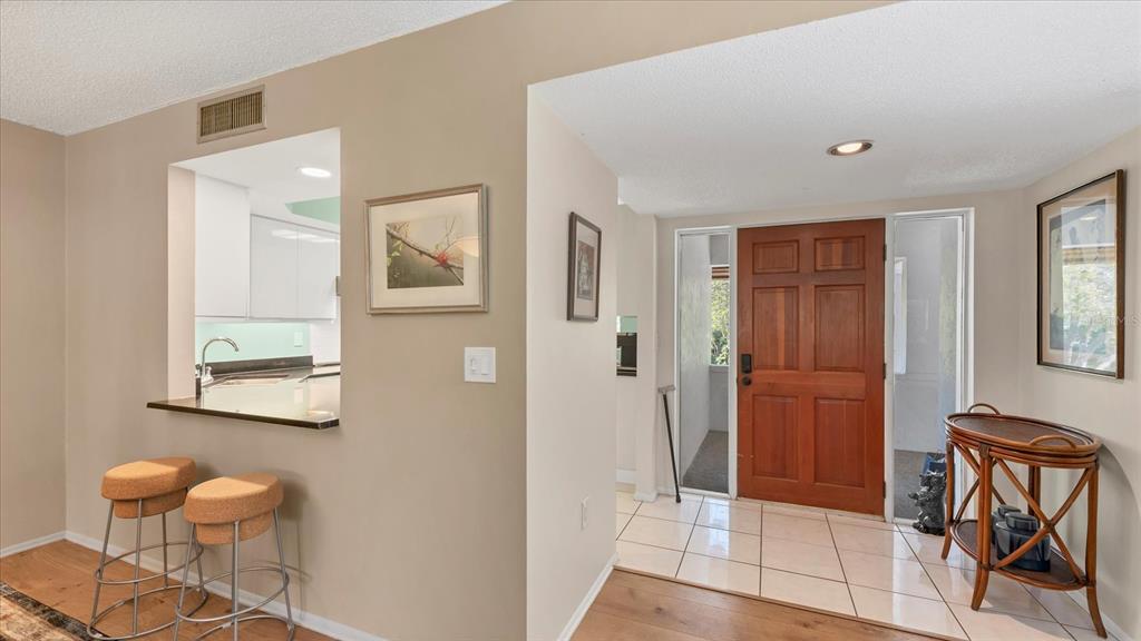 4957 Cross Creek Road, Unit 4957 Sarasota, FL 34231 - Photo 9 of 32 a view of room with furniture and windows