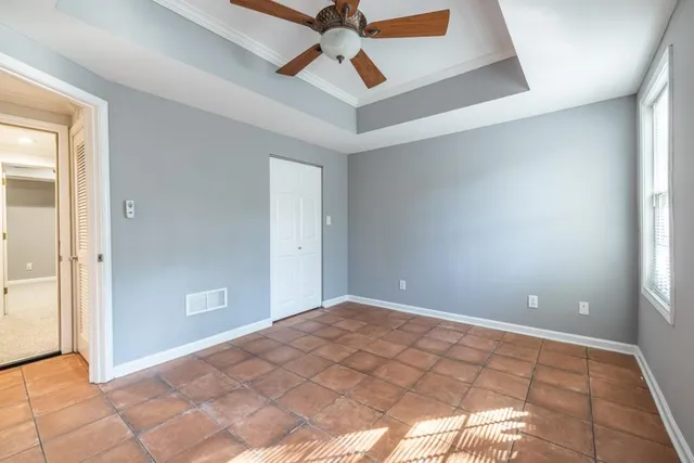 a view of a room with a big yard