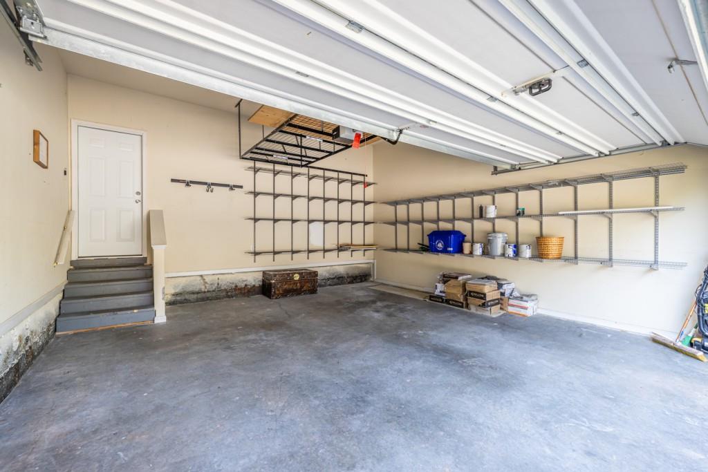 1759 Regency Park Walk Atlanta, GA 30341 - Photo 56 of 61 a view of a garage with parked cars