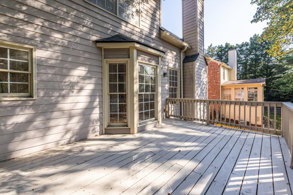 1759 Regency Park Walk Atlanta, GA 30341 - Photo 57 of 61 a view of a brick house with a large window