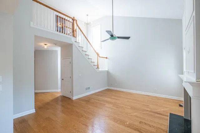 a large kitchen with stainless steel appliances granite countertop a stove a sink and a refrigerator