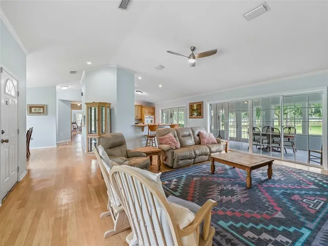 a living room with furniture and a table