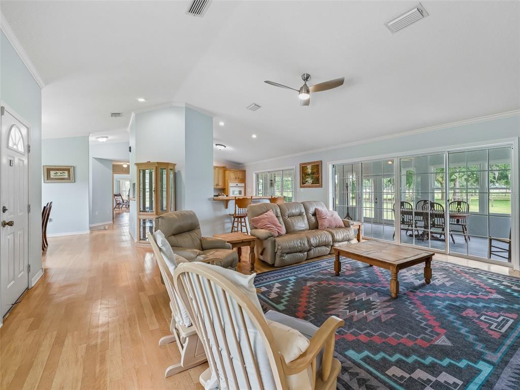 1500 Northwest 155th Street Citra, FL 32113 - Photo 12 of 43 a living room with furniture and a table
