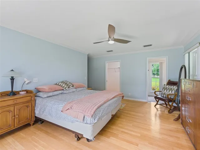 a bedroom with a bed and furniture