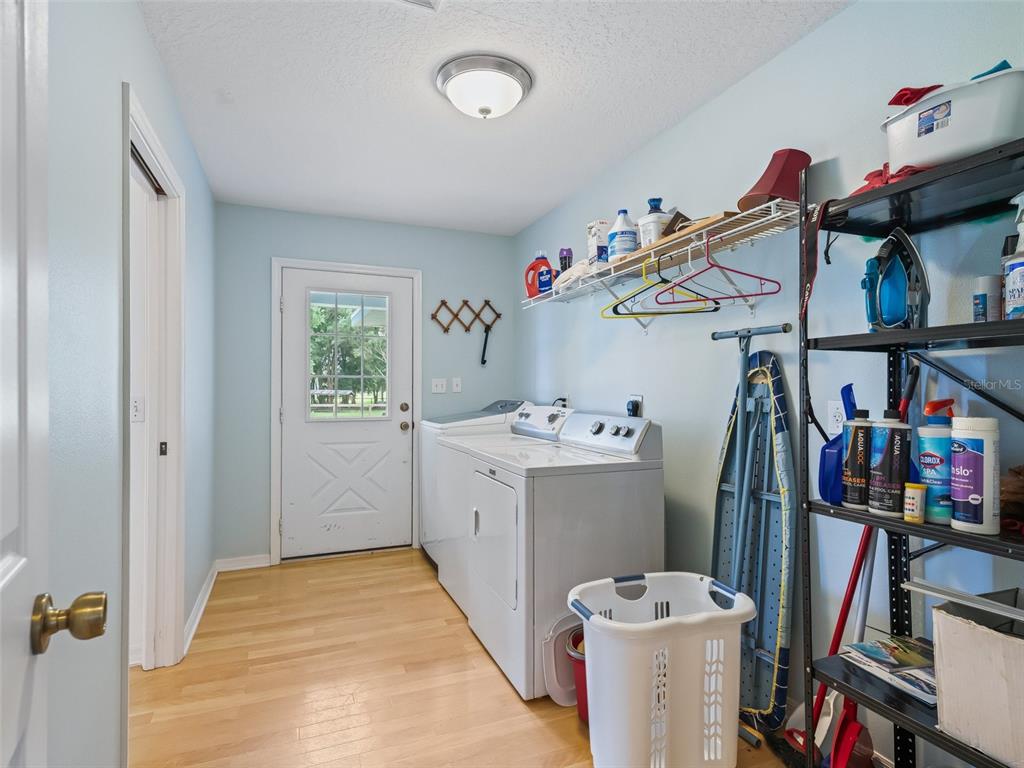 1500 Northwest 155th Street Citra, FL 32113 - Photo 20 of 43 a view of a storage & utility room with stuff