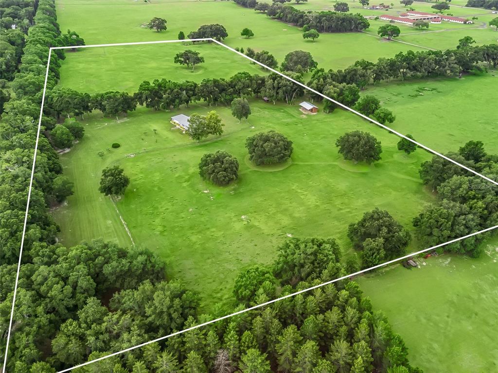 1500 Northwest 155th Street Citra, FL 32113 - Photo 2 of 43 a view of a tennis court