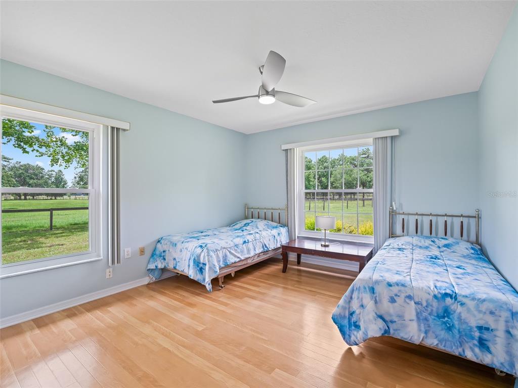 1500 Northwest 155th Street Citra, FL 32113 - Photo 21 of 43 a bedroom with a bed and a window