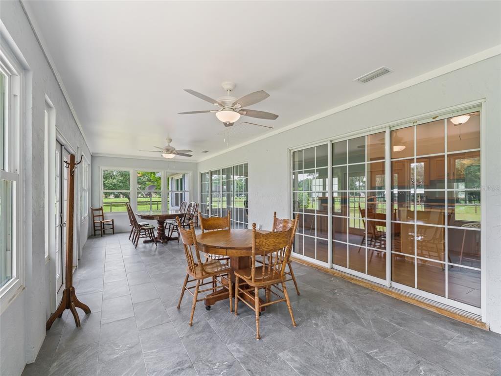 1500 Northwest 155th Street Citra, FL 32113 - Photo 27 of 43 a view of a dining room with furniture window and outside view