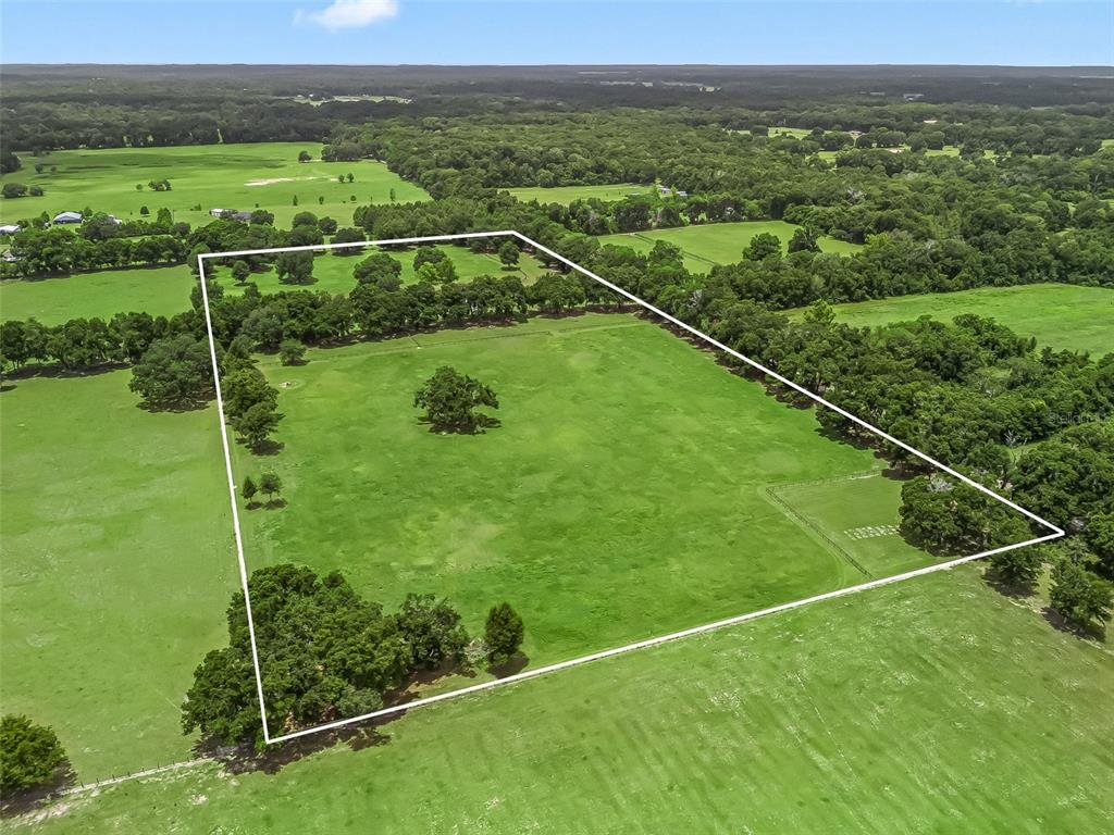 1500 Northwest 155th Street Citra, FL 32113 - Photo 43 of 43 a view of a field with sitting area